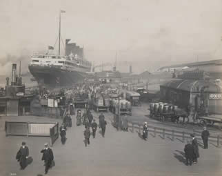 People disembarking at a dock
